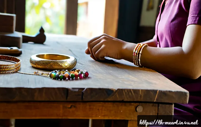 금속공예와 패션 액세서리 - Photorealistic artisan jewelry workshop in Thailand, a skilled craftsperson’s hands shaping a delica...